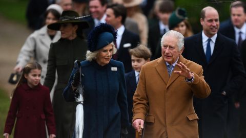 King Charles and Britain's Camilla, Queen Consort arrive at St. Mary Magdalene Church in Sandringham, Norfolk, on December 25, 2022.