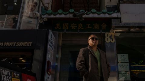 Kenny Wong stands in front of the On Leong Association building, an organization he was associated with as a gang member in Manhattan's Chinatown, New York City, on December 17. Wong used to be a member of Chinatown's Ghost Shadow gang from 1984 to 1993, until he was arrested and sent to prison. Wong says it was 