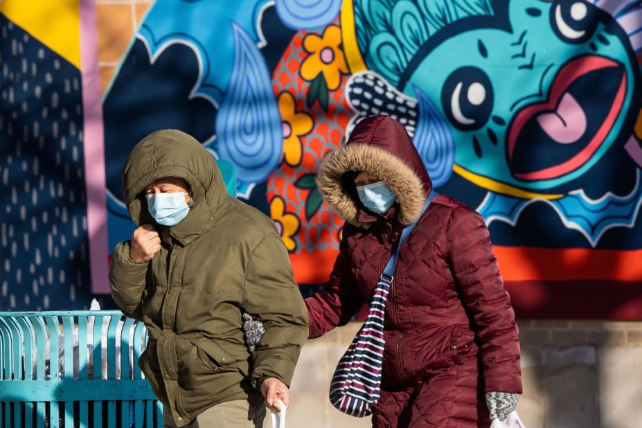 Pedestrians deal with the cold in Chicago on December 24.