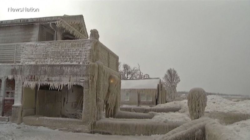 See houses frozen over by massive winter storm | CNN