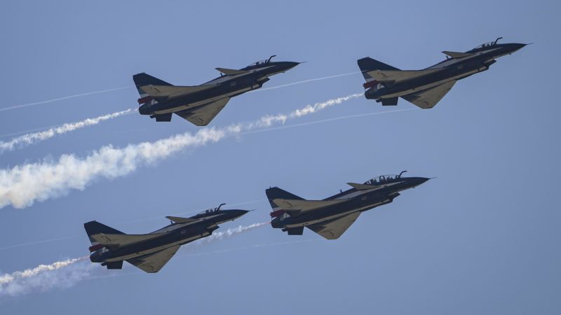 China carries out military exercises near Taiwan and Japan, sending 47 aircraft across Taiwan Strait in ‘strike drill’ | CNN