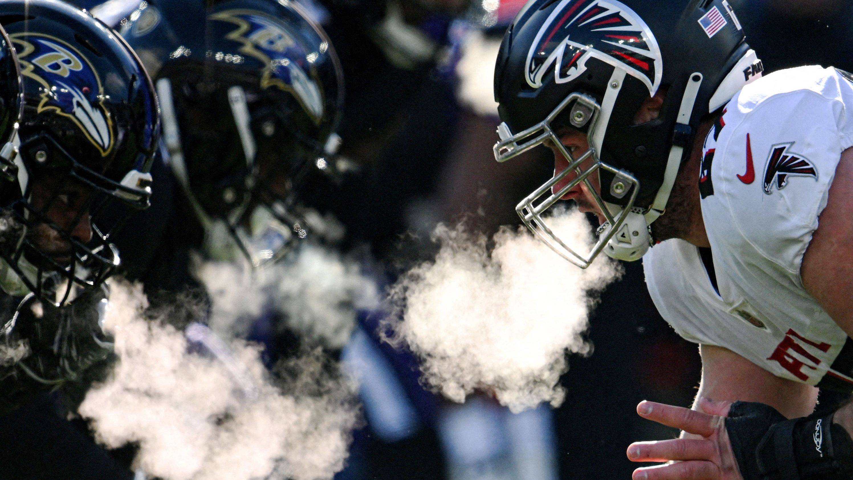 Atlanta Falcons center Drew Dalman prepares to snap the ball during the first half against the Baltimore Ravens at the M&T Bank Stadium. The Ravens won 17-9.