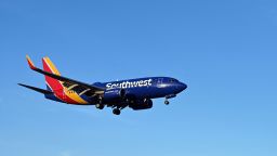 A Southwest Airlines plane approaches the runway at Ronald Reagan Washington National Airport (DCA) in Arlington, Virginia, on April 2, 2022. (Photo by Daniel SLIM / AFP) (Photo by DANIEL SLIM/AFP via Getty Images)