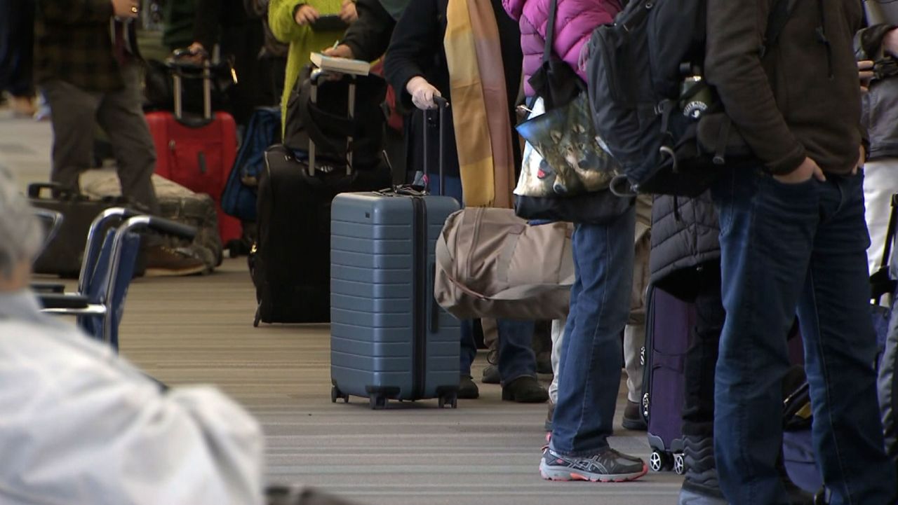 Long lines at Southwest counters Monday, Dec. 26, 2022, at Raleigh--Durham International Airport.
 
