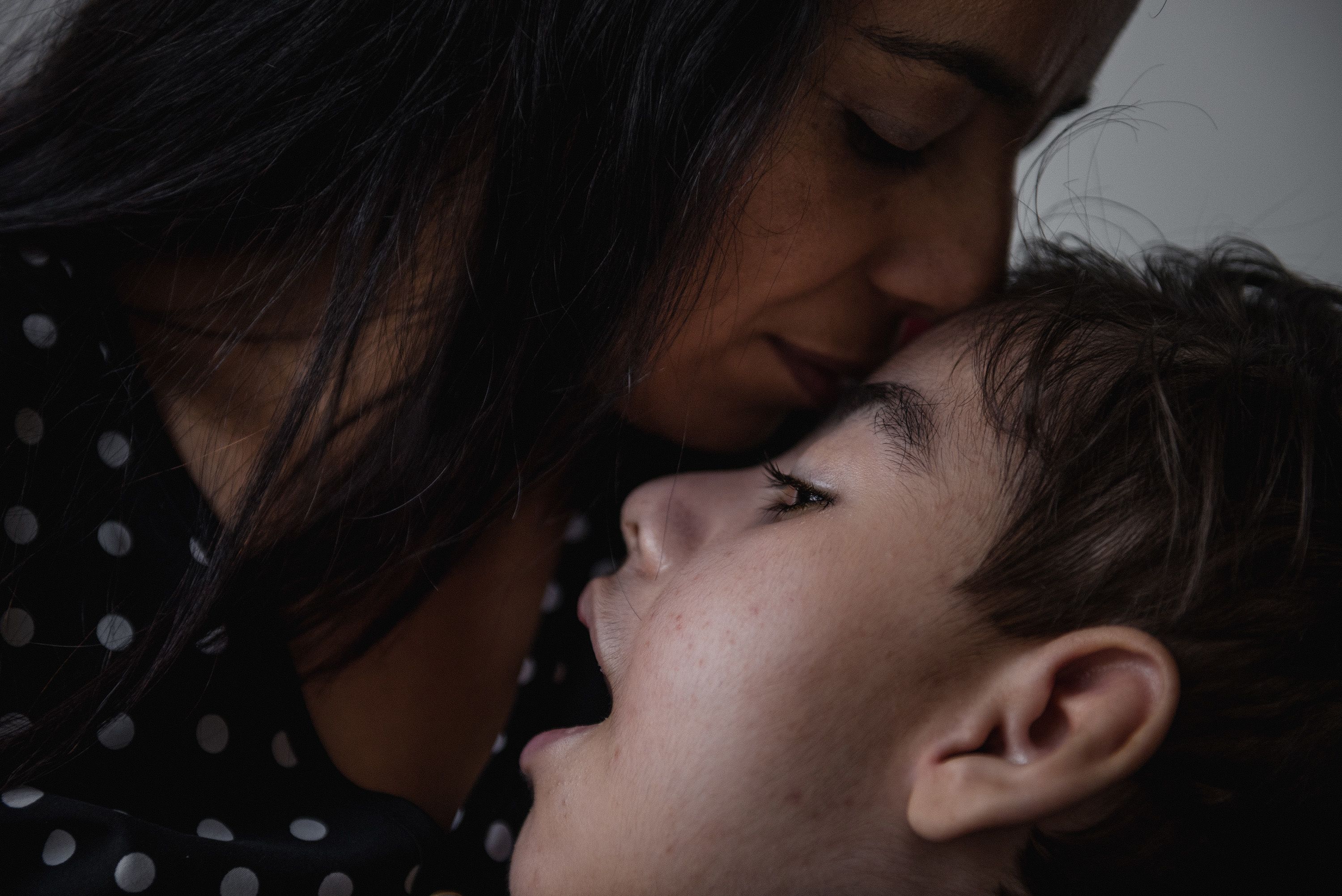 A woman named Regina kisses her son Davi, who was born with microcephaly, a condition where the baby's head is much smaller than expected. Davi was one of thousands of Brazilian children born with the condition during a Zika virus outbreak a few years ago. The doctor told her that her son was going to die and that she should get used to it, Regina told photographer <a href="https://mairaerlich.com/" target="_blank" target="_blank">Maíra Erlich</a>. "How does a doctor say that?" Regina said. "So, I asked him, 'Are you God?' He told me Davi had a tiny head, and I said: 'He's beautiful.' That's it.' "