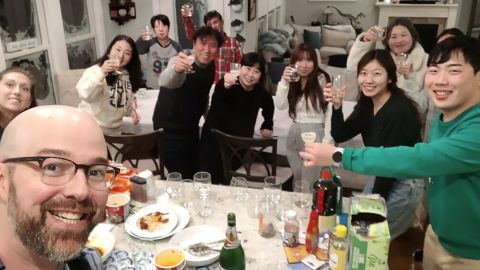 The Campagnas share a meal with a South Korean tour group who were stranded because of the storm. 