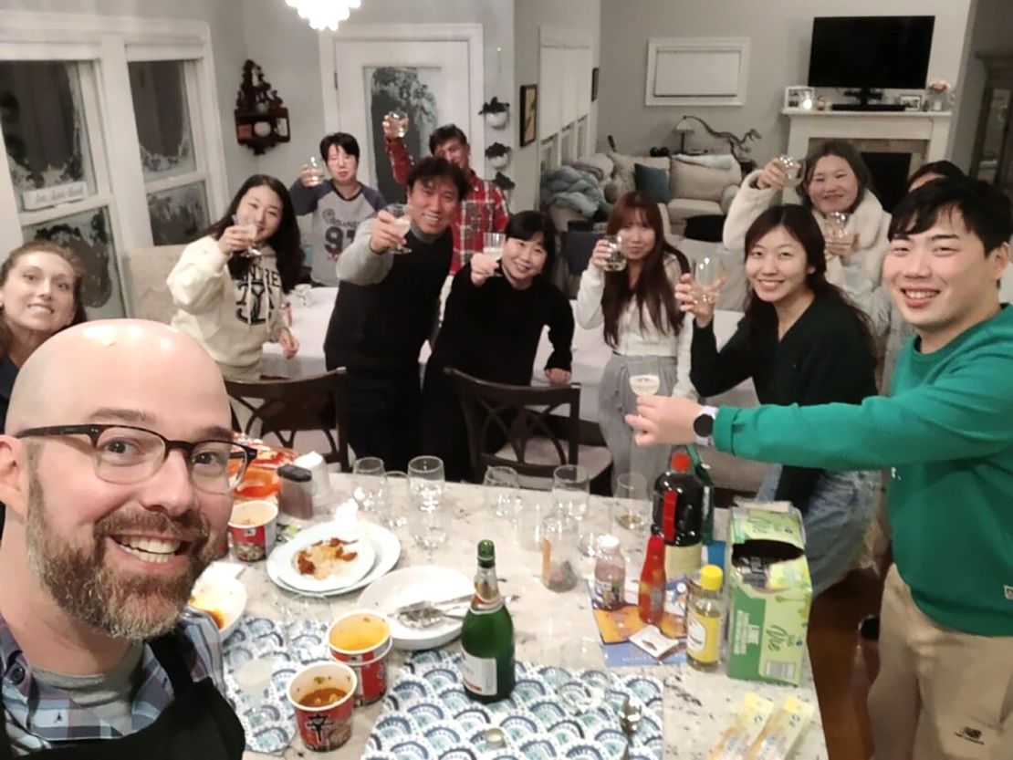 The Campagnas share a meal with a South Korean tour group who were stranded because of the storm. 