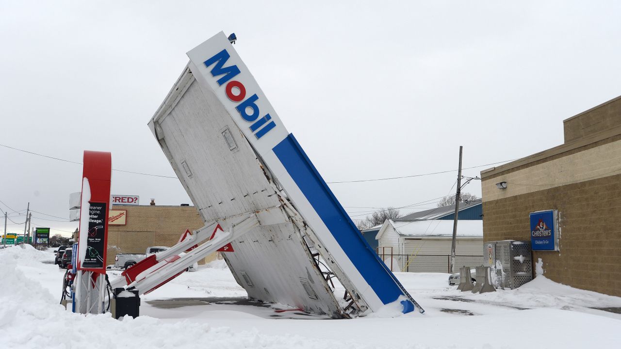 LACKAWANNA, NY - DECEMBER 27:  A gas station canopy lays on its side after high winds and heavy snow along Lake Shore Boulevard on December 27, 2022 in Lackawanna, New York. The historic winter storm Elliott dumped up to four feet of snow on the area leaving thousands without power and at least 28 confirmed dead in the city of Buffalo and the surrounding suburbs. (Photo by John Normile/Getty Images)