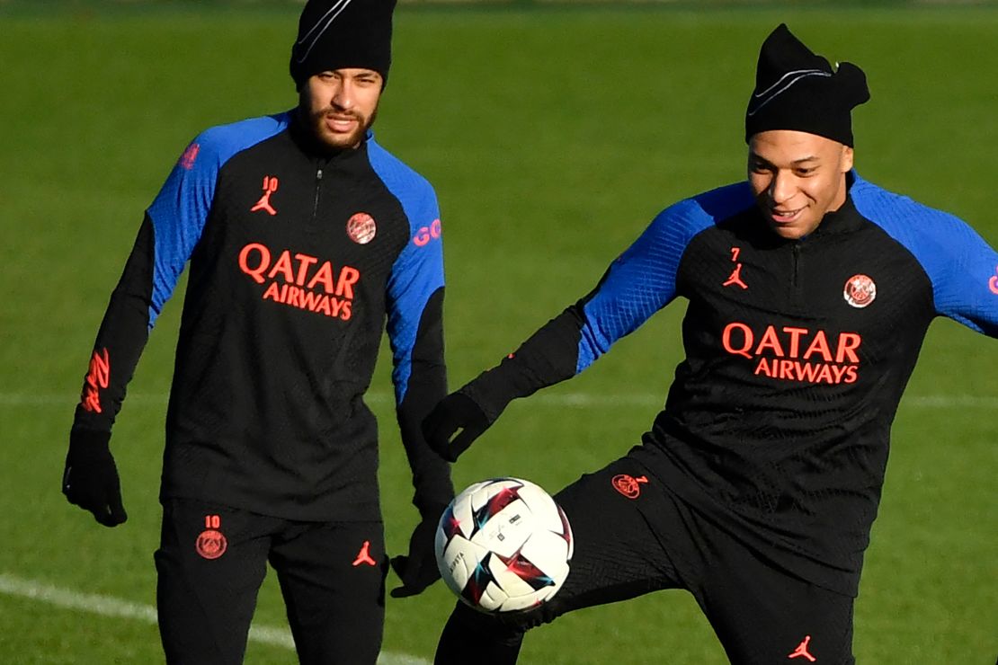 PSG forwards Neymar Jr. and Kylian Mbappé (R) take part in a training session at the club's "Camp des Loges" training ground in Saint-Germain-en-Laye on the eve of the  Ligue 1 game against Strasbourg.