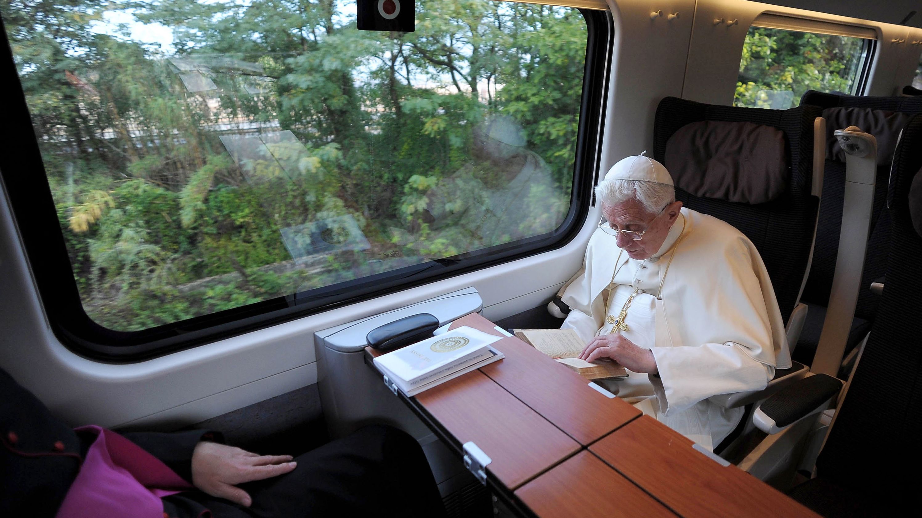 Benedict travels by train to Assisi, Italy, in October 2011.