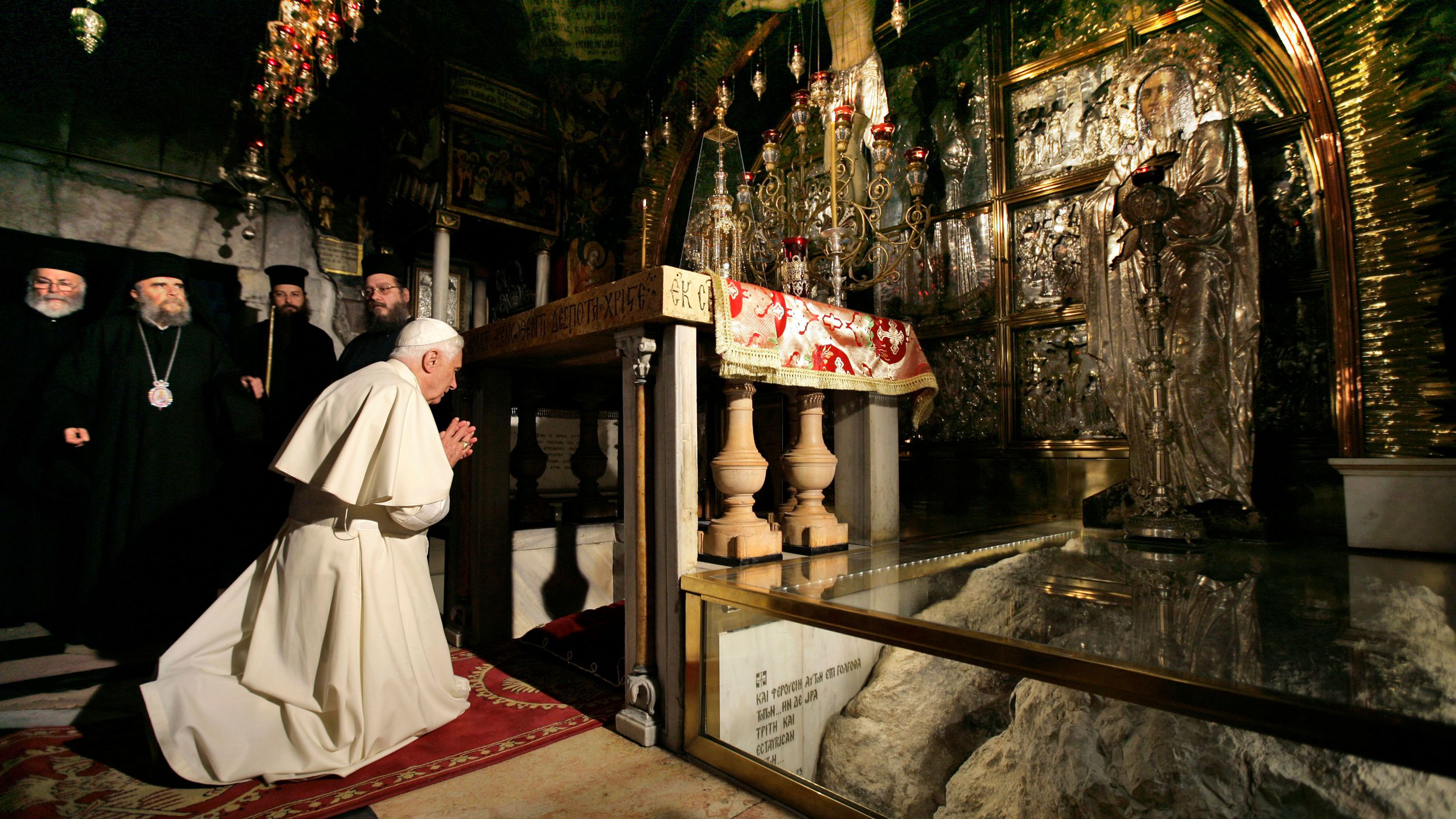 Benedict prays in the Church of the Holy Sepulcher during his trip to Jerusalem's Old City in 2009.
