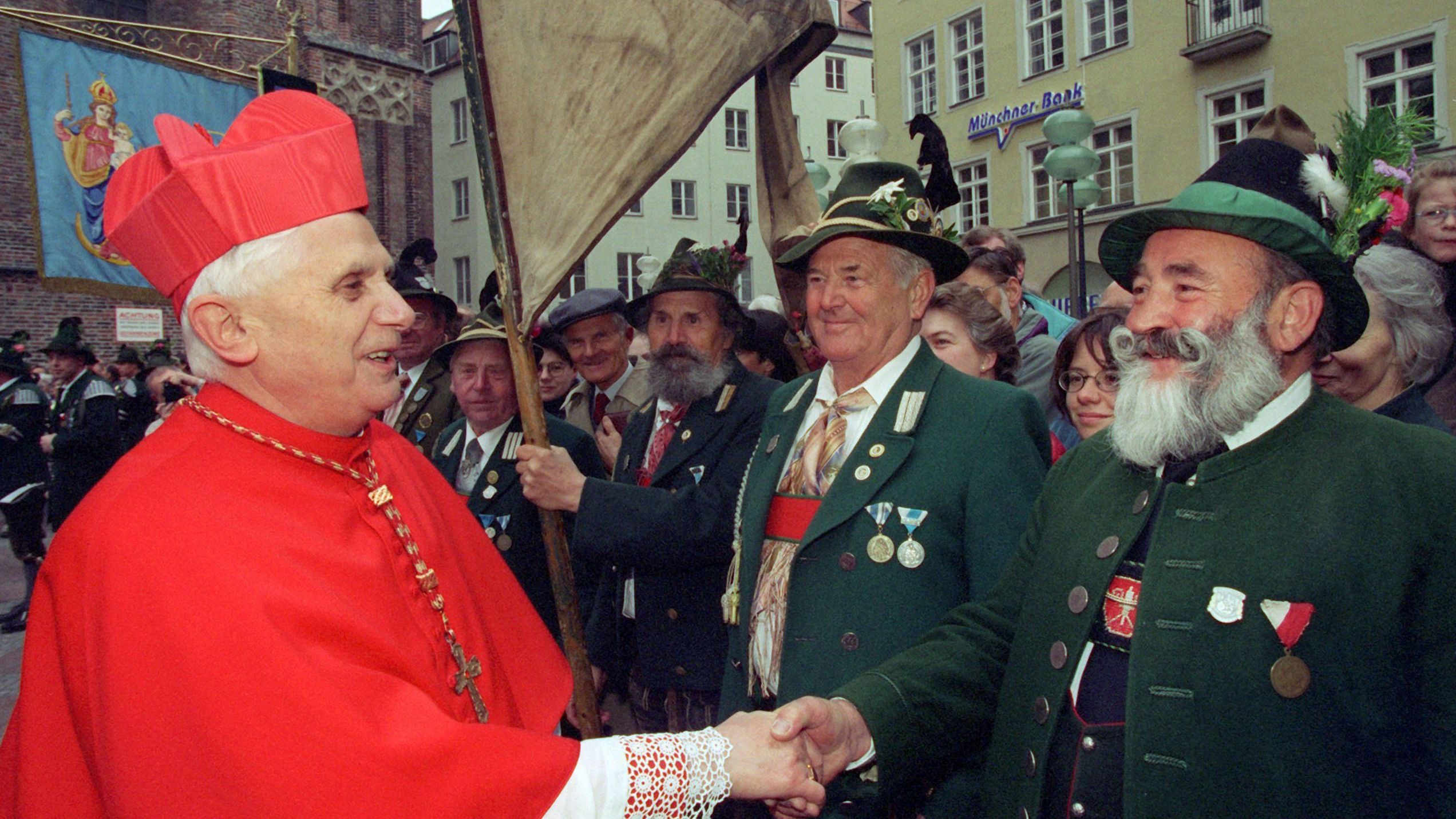 Benedict greets a mountain rifleman in Munich in 1997. Before that, he had celebrated the 20th anniversary of his episcopal consecration.