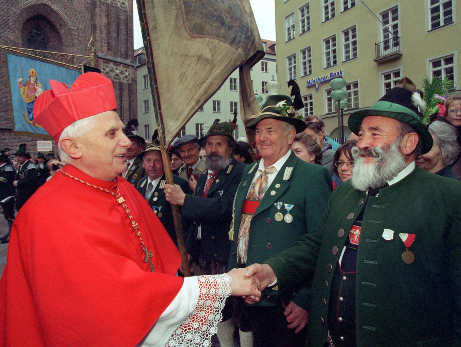 Benedict greets a mountain rifleman in Munich in 1997. Before that, he had celebrated the 20th anniversary of his episcopal consecration.