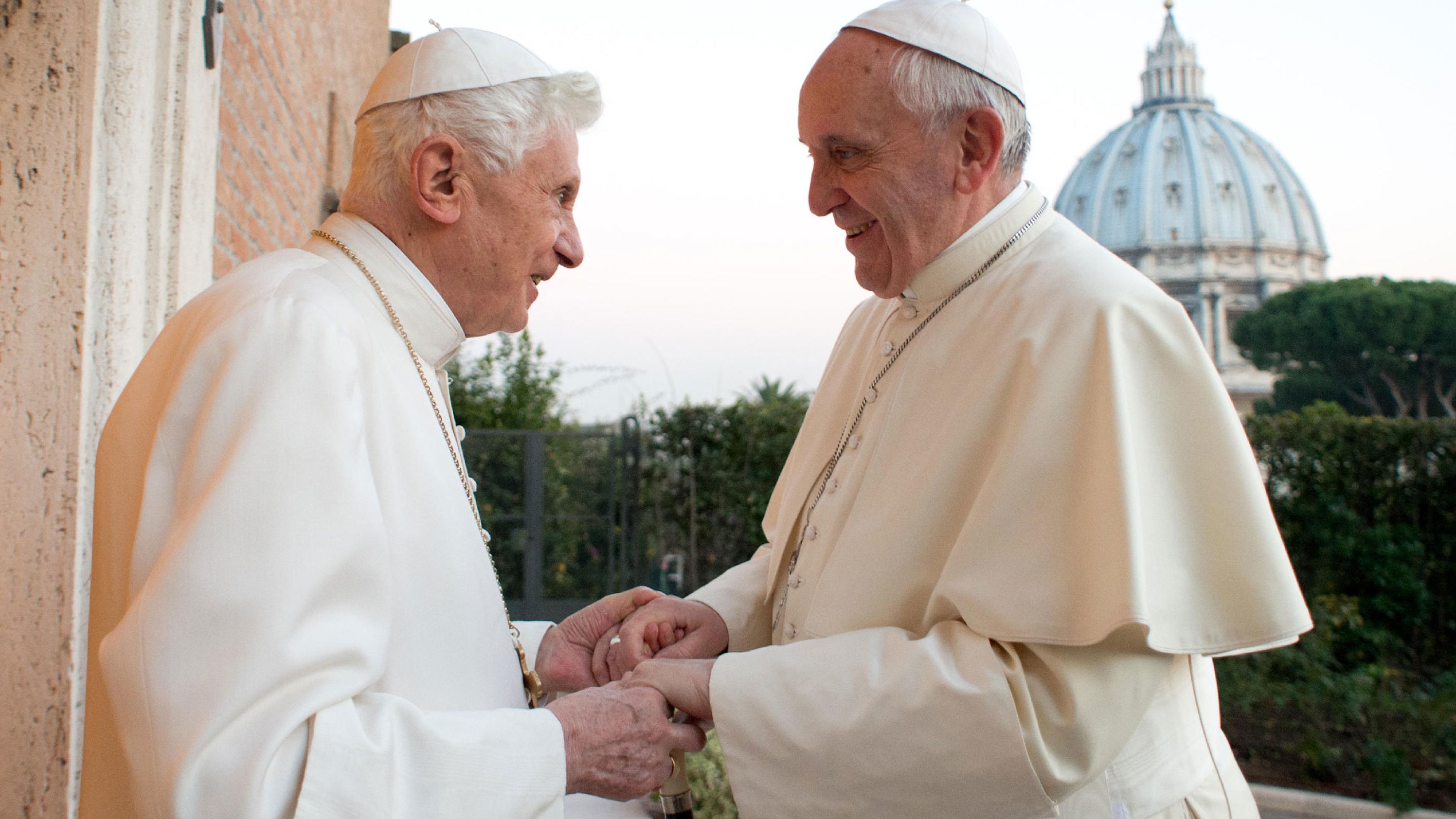 Benedict exchanges Christmas greetings with his successor, Pope Francis, at the Vatican in December 2013.