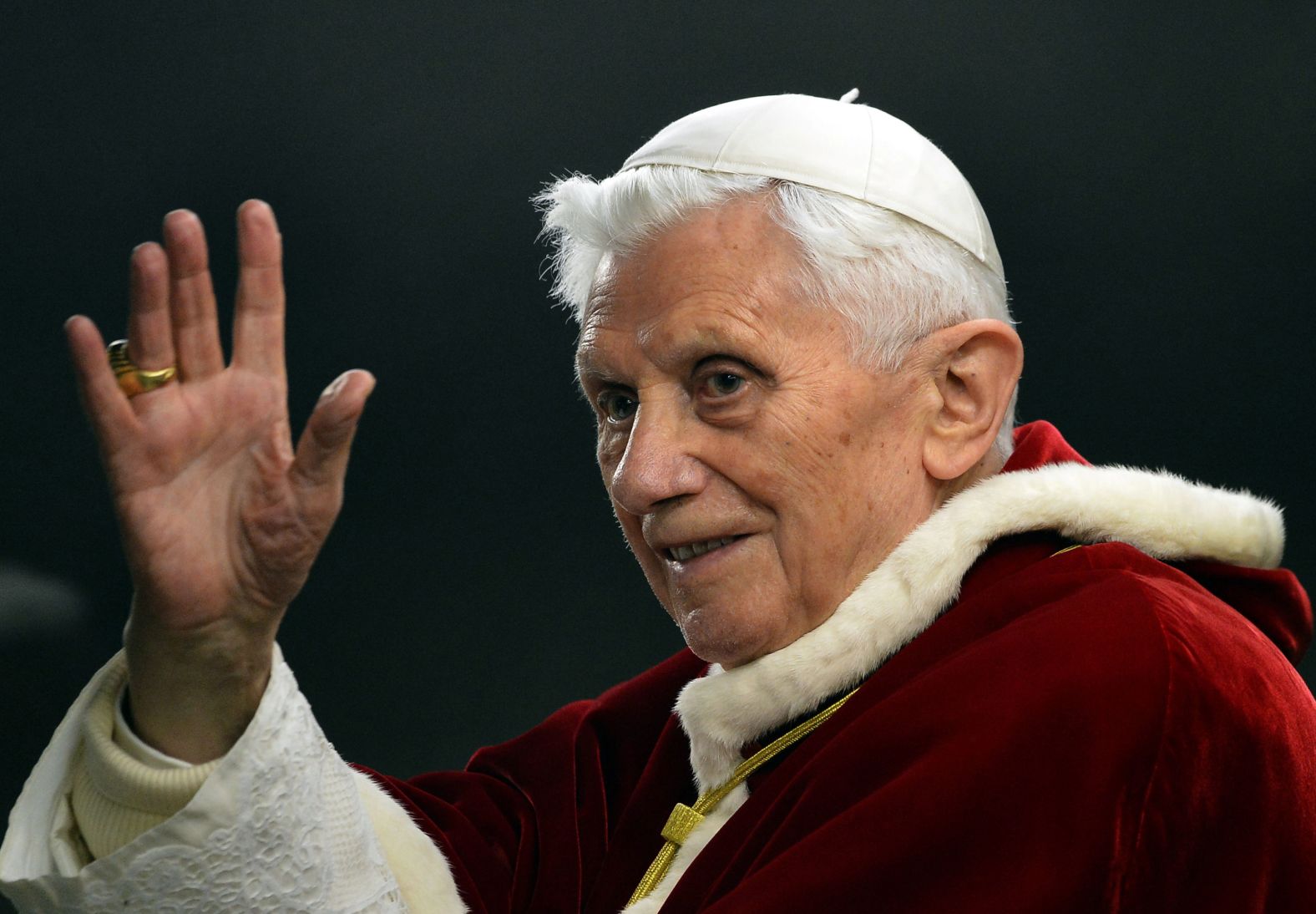 Benedict waves at the Vatican in December 2012.