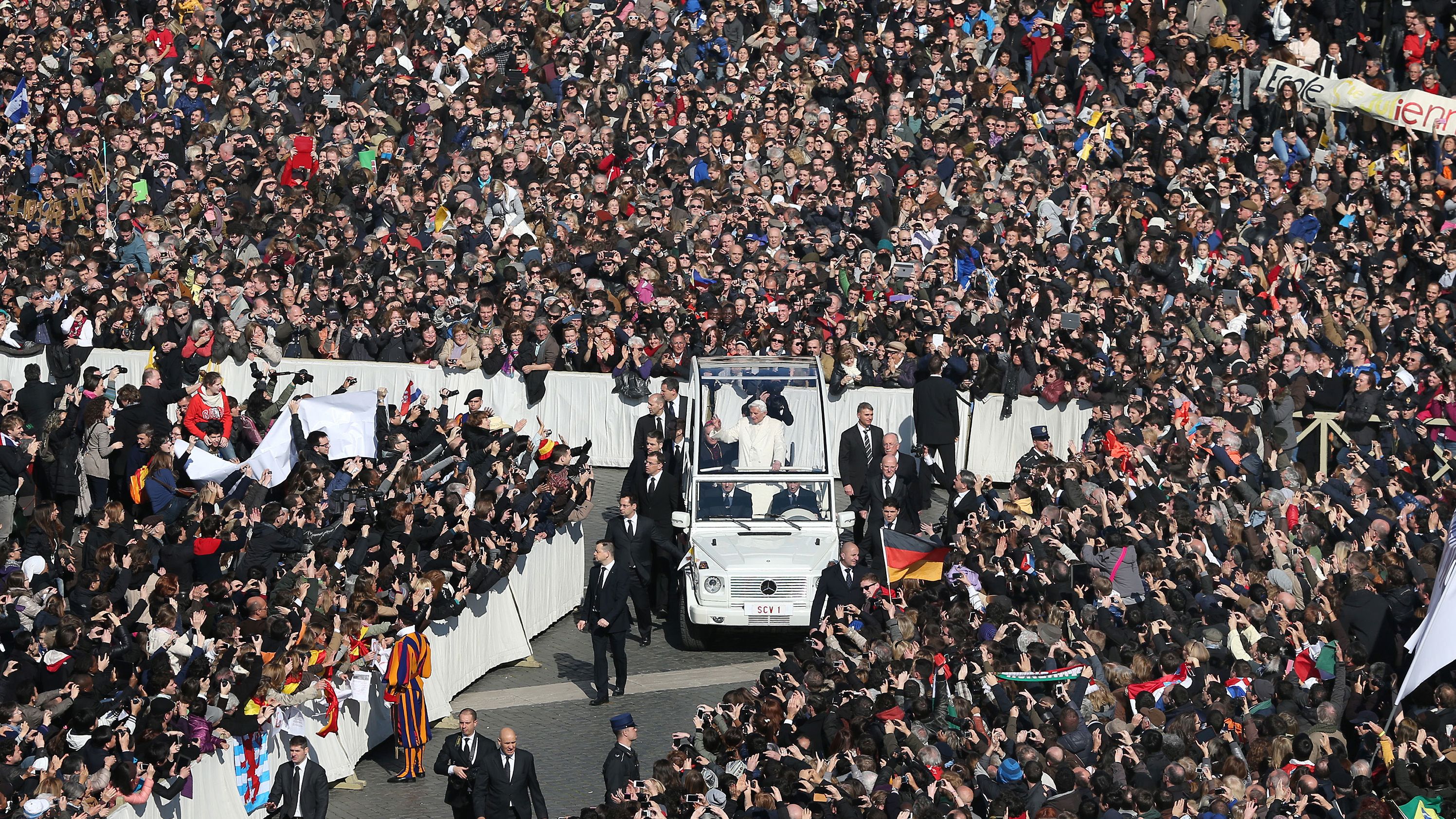 Benedict rides the "popemobile" to St. Peter's Square in February 2013. Earlier that month, he announced that he would be retiring. The 85-year-old cited his "advanced age" as the reason.