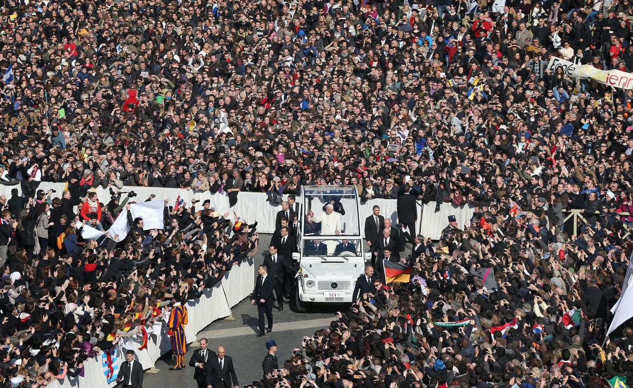 Benedict rides the "popemobile" to St. Peter's Square in February 2013. Earlier that month, he announced that he would be retiring. The 85-year-old cited his "advanced age" as the reason.