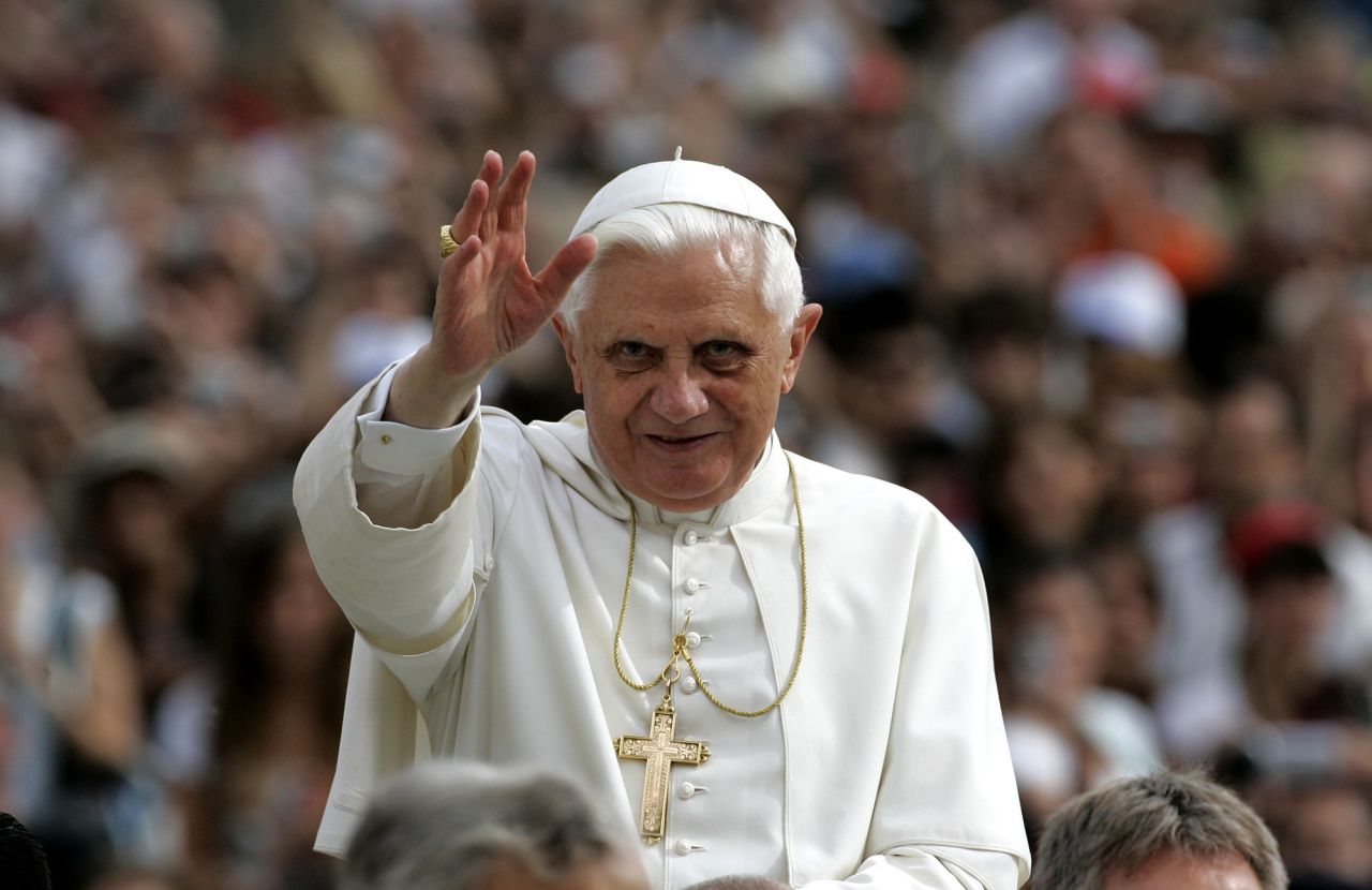 Benedict waves as he is driven through the crowd in St. Peter's Square in September 2007.