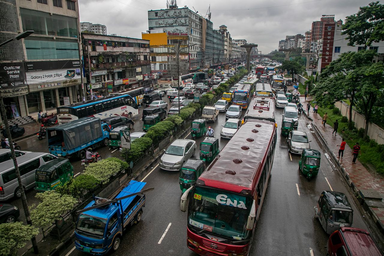 Commuters make their way through a traffic jam in Dhaka, Bangladesh on September 13, 2022. 