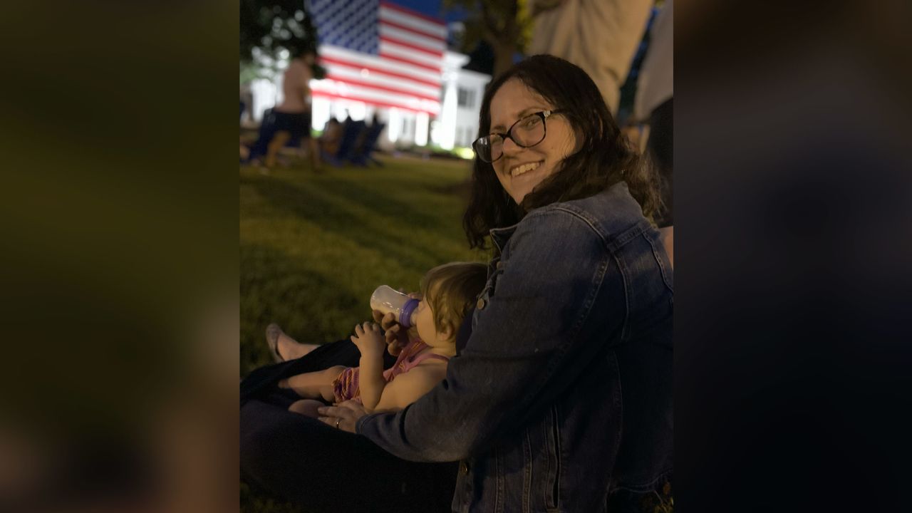 My husband captured this moment on my 40th birthday this year, as I fed my daughter while we watched July 4 fireworks. Caring for her has changed the way I look at my life.