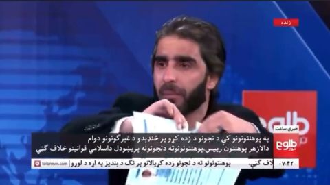 Ismail Mashal tears his diplomas on television in protest of the Taliban's ban on women's higher education