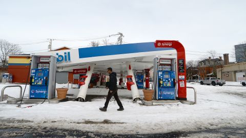 A gas station canopy collapses along Niagara Street in downtown Buffalo, New York, on December 28, 2022. 