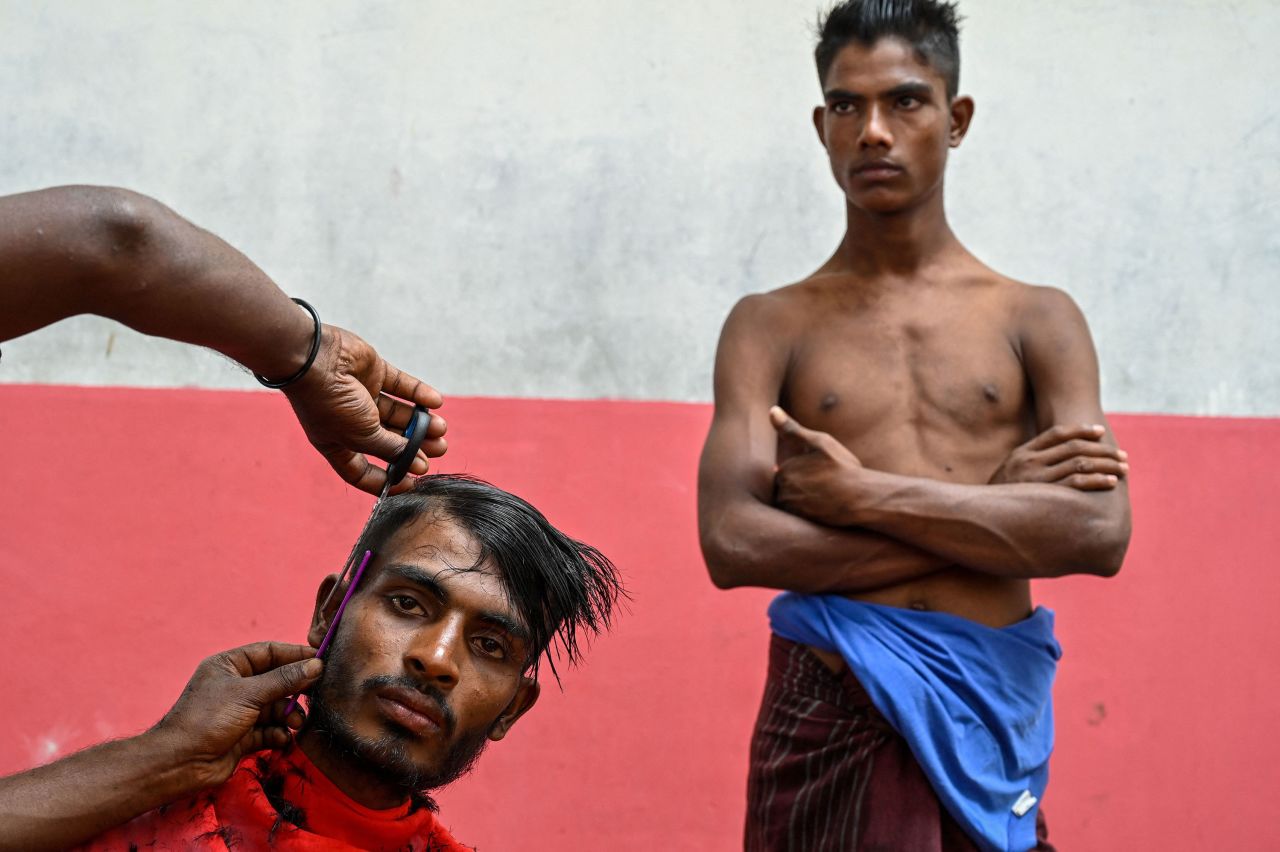 A Rohingya refugee gets a haircut at a temporary shelter after arriving by boat in Laweueng, Indonesia, on Tuesday, December 27. A boat carrying nearly 200 people came ashore on Tuesday, authorities said, the country's fourth such landing in recent months. Since 2020, more than 3,000 Rohingya <a href="https://www.cnn.com/2022/12/26/asia/rohingya-refugees-united-nations-indonesia-unhcr-intl-hnk/index.html" target="_blank">have attempted the risky journey from Bangladesh</a> by sea, according to the United Nations. Around 1 million members of the stateless Muslim minority live in Bangladesh after they fled a brutal campaign of killing and arson by the Myanmar military.