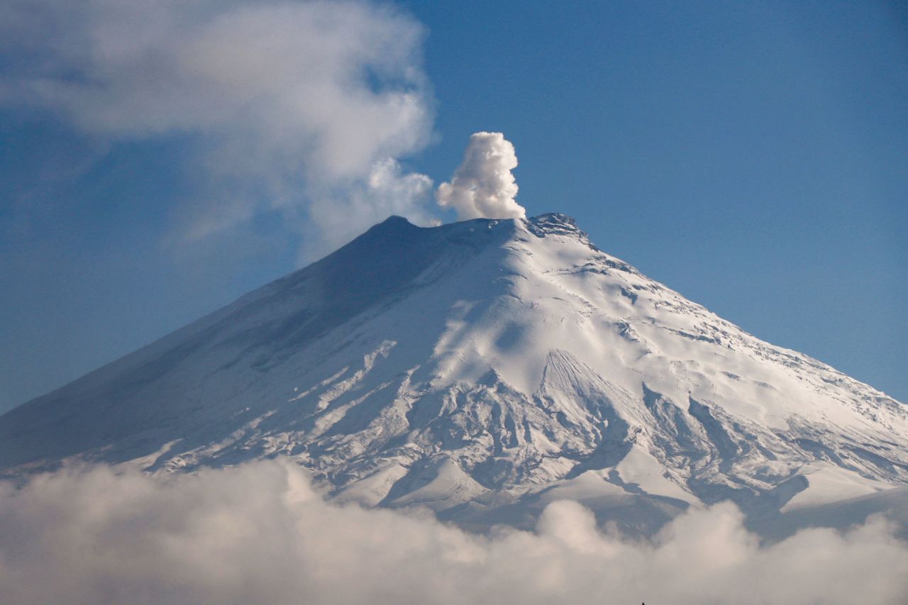 The Cotopaxi volcano emits ash and gases near Mulalo, Ecuador, on Wednesday, December 28.