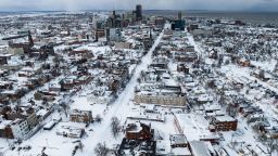 Snow blankets the city in this aerial drone photograph in Buffalo, New York, on December 25, 2022. - US emergency crews counted the grim costs of a colossal winter storm that brought Christmas chaos to millions, especially in hard-hit western New York, where the death toll reached 25 Monday in what authorities described as a "war with mother nature." 