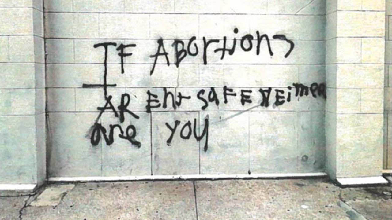 The message was spray painted on the side of the church.