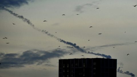 Ukrainians defiant amid one of Moscow's biggest missile barrages 4 Missiles contrails seen in the sky over Kyiv amid a wave of Russian attacks.