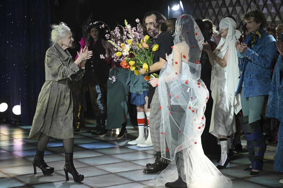 Vivienne Westwood, Andreas Kronthaler and Bella Hadid walk the runway during the Vivienne Westwood Fall/Winter 2022-2023 fashion show as part of Paris Fashion Week on March 5, 2022 in Paris, France. 