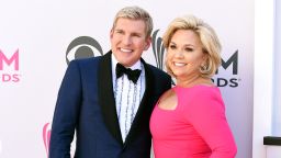 FILE - Todd Chrisley, left, and his wife, Julie Chrisley, pose for photos at the 52nd annual Academy of Country Music Awards on April 2, 2017, in Las Vegas. Todd and Julie Chrisley were driven by greed as they engaged in an extensive bank fraud scheme and then hid their wealth from tax authorities while flaunting their lavish lifestyle, federal prosecutors said, arguing the reality television stars should receive lengthy prison sentences. They were found guilty on federal charges in June and are set to be sentenced by U.S. District Judge Eleanor Ross in a hearing that begins Monday, Nov. 21. (Photo by Jordan Strauss/Invision/AP, File)