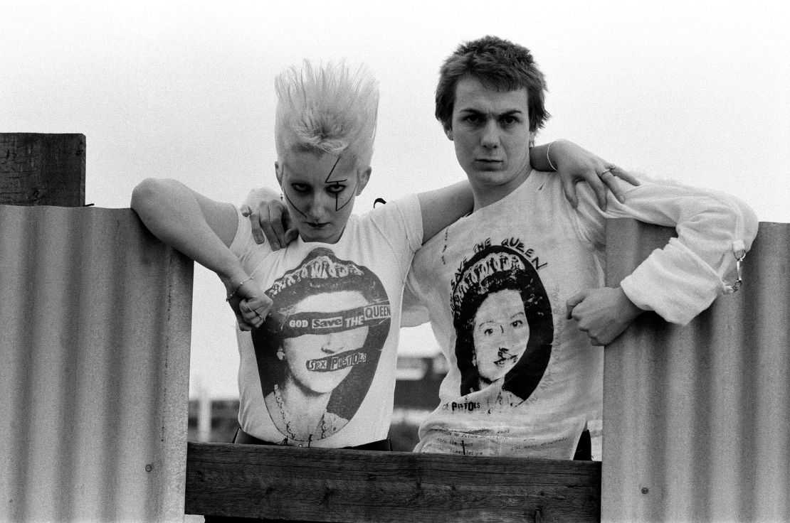 Pamela Rooke, known as Jordan, and Simon Barker, called Six, model Westwood's 'God Save The Queen' tees. Both were supporters of the Sex Pistols, and Jordan worked at Westwood's boutique. 