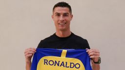 RIYADH, SAUDI ARABIA - DECEMBER 30: (----EDITORIAL USE ONLY â MANDATORY CREDIT - "ALL NASSR FOOTBALL CLUB / HANDOUT" - NO MARKETING NO ADVERTISING CAMPAIGNS - DISTRIBUTED AS A SERVICE TO CLIENTS----) Portuguese football star Cristiano Ronaldo poses for a photo with the jersey after signing with Saudi Arabia's Al-Nassr Football Club in Riyadh, Saudi Arabia on December 30, 2022. (Photo by Al Nassr Football Club / Handout/Anadolu Agency via Getty Images)
