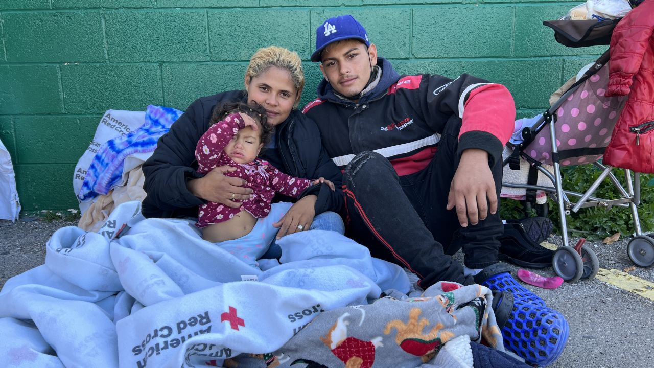 Anthony Blanco poses with his wife Glenda Matos and 1-year-old Brenda in the cold of El Paso, Texas.