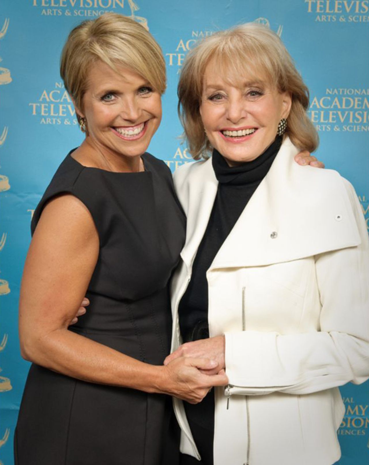 Walters and fellow TV journalist Katie Couric attend the Emmy Awards in 2009.