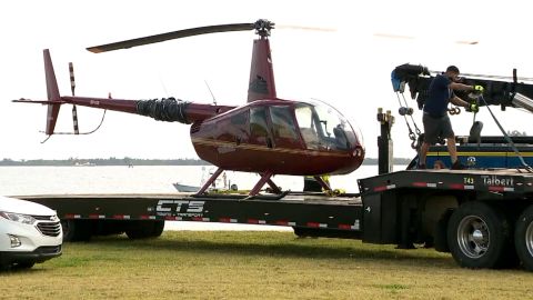 The helicopter was towed away after being rescued. 