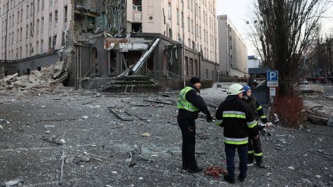 Rescuers worked at the site of explosions in Kyiv.