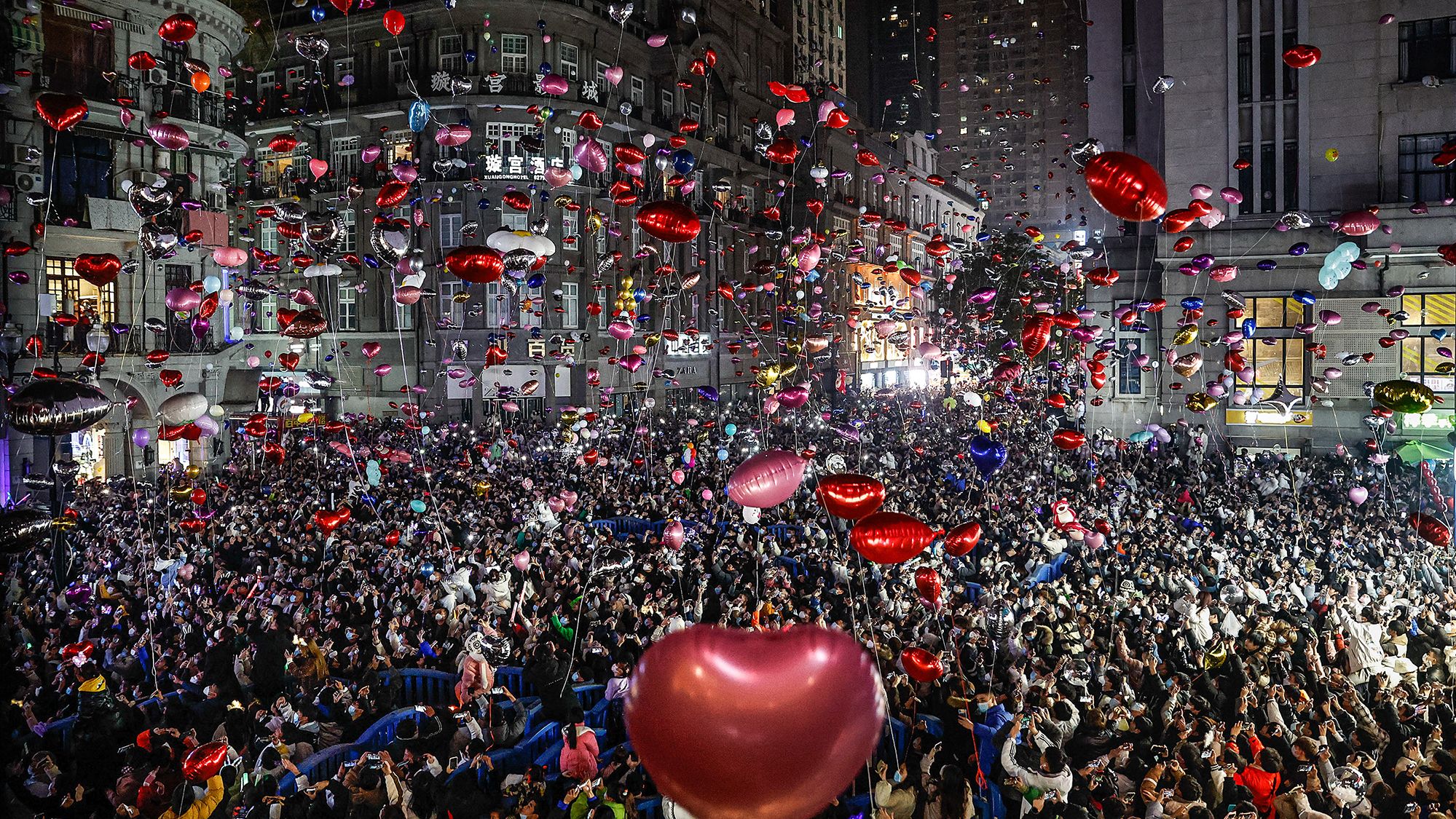 Revelers release balloons to celebrate the new year in Wuhan, China.