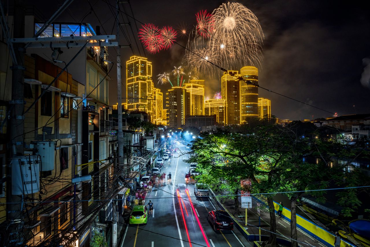 Fireworks explode in Makati, Philippines.