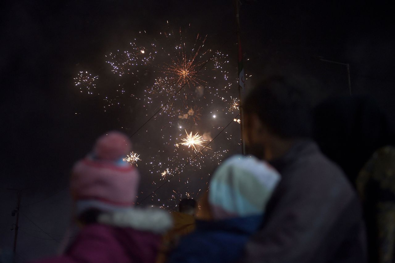 People watch a fireworks show in Karachi, Pakistan.