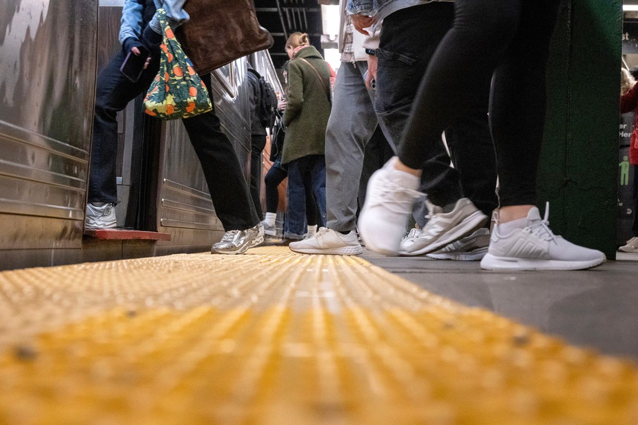 Commuters at a subway station in New York, on April 25, 2024. 