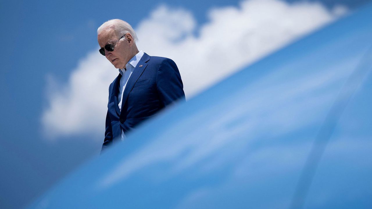 President Joe Biden disembarks Air Force One at T.F. Green International Airport in Warwick, Rhode Island, on July 20, 2022.