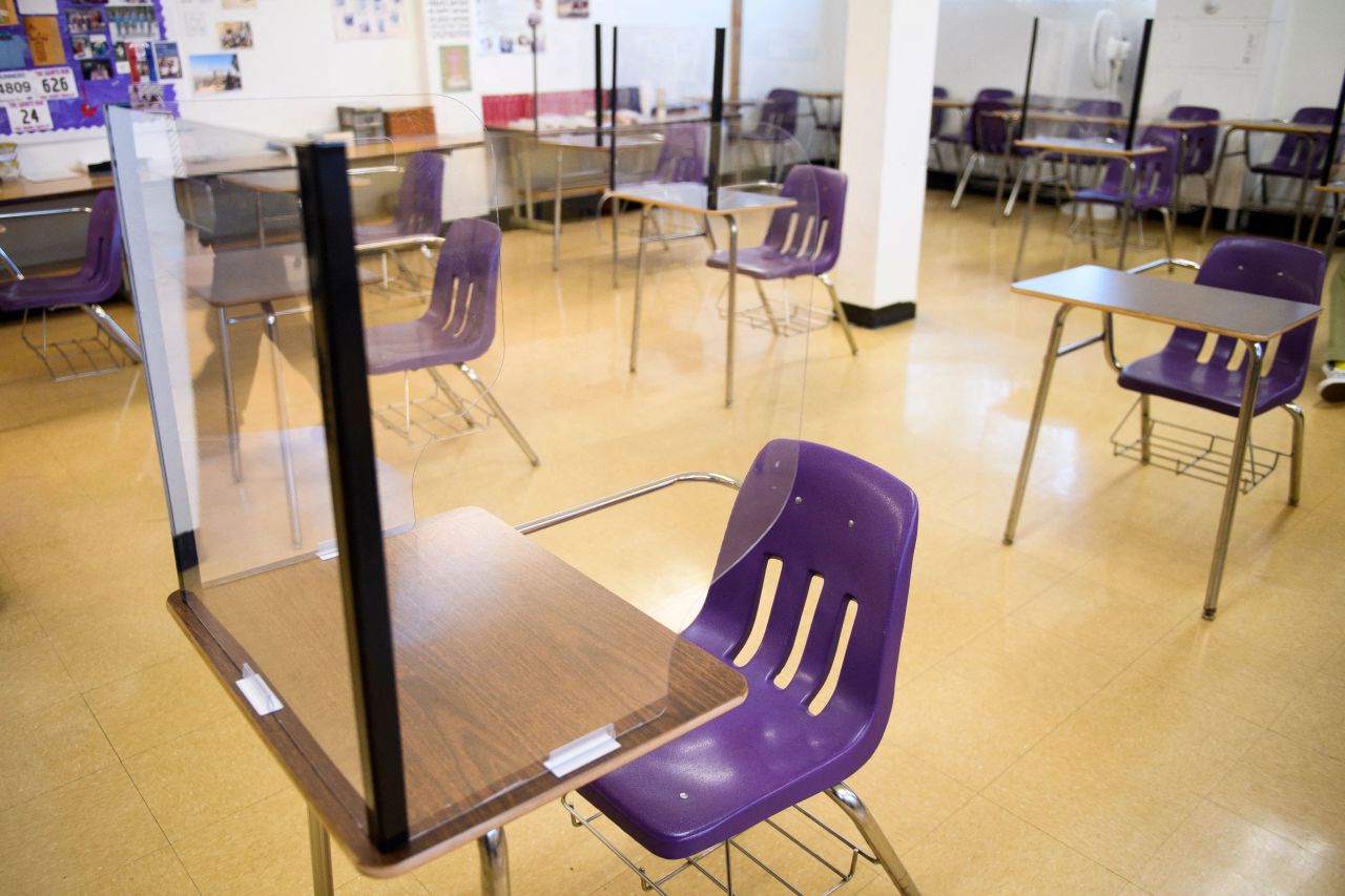 Plexiglass dividers surround desks at St. Anthony High School in Long Beach, California, on March 24.