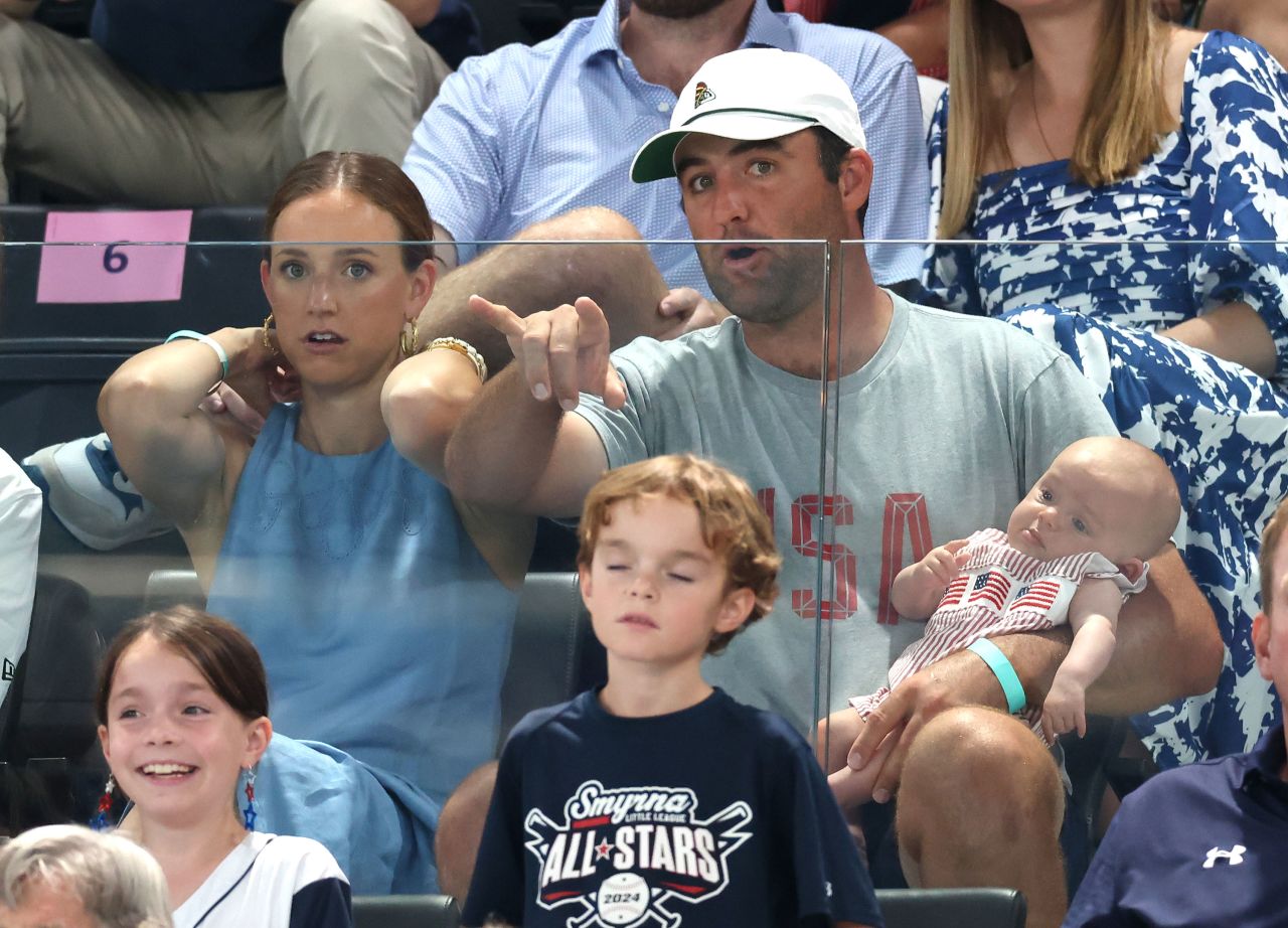 Golfer Scottie Scheffler looks on during competition.