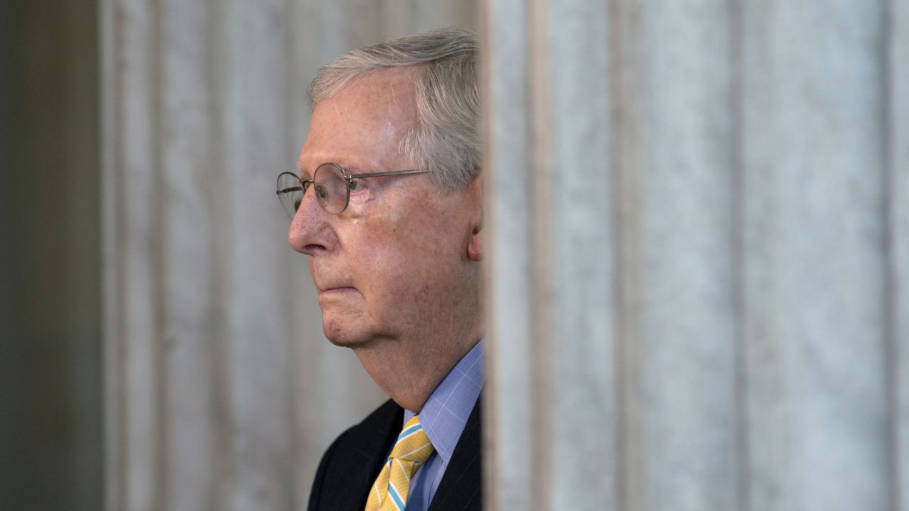 Senate Majority Leader Mitch McConnell pauses during a television interview on Tuesday.