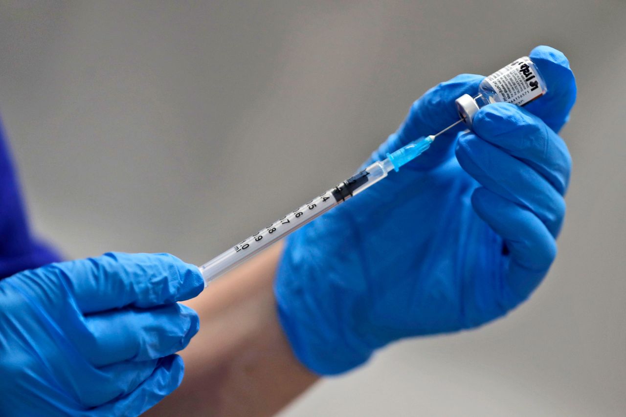 A nurse prepares to administer the Pfizer/BioNTech Covid-19 vaccine at Guy's Hospital in London on December 8.