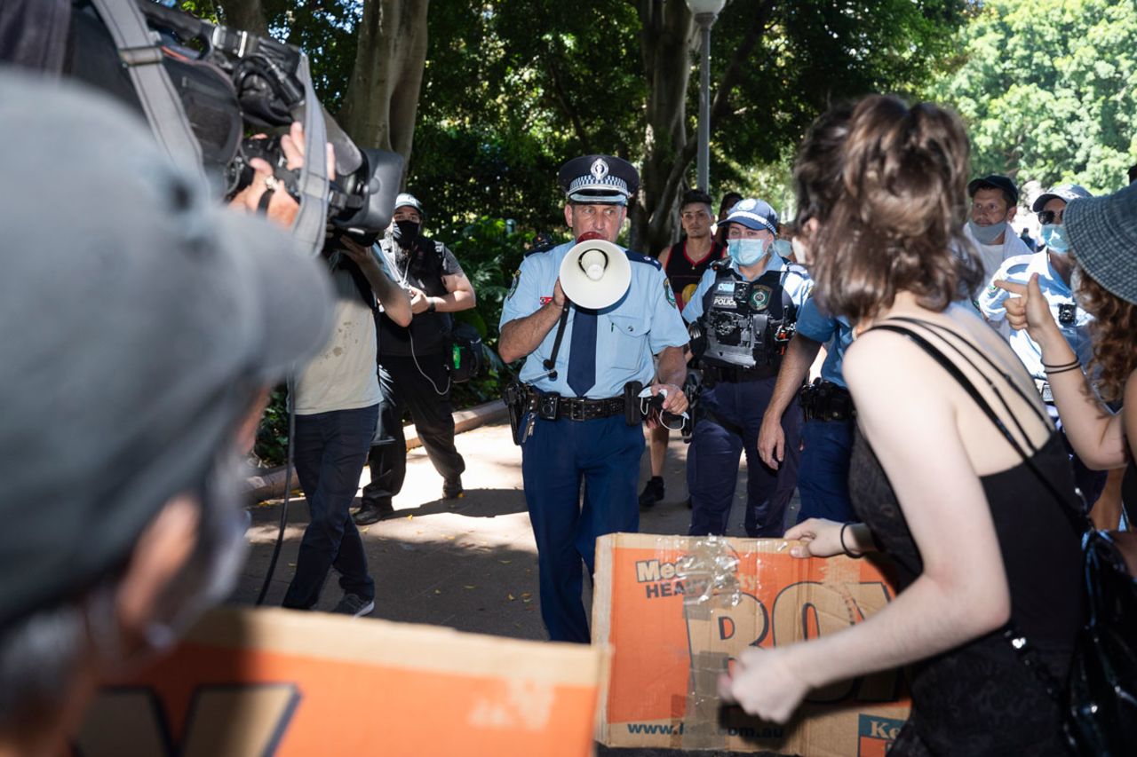 Police confront protesters in Hyde Park after the main section of the "Invasion Day" Rally had ended on January 26 in Sydney, Australia.