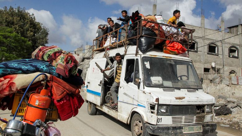Displaced Palestinians travel in a vehicle as they flee Rafah, Gaza, May 12. 